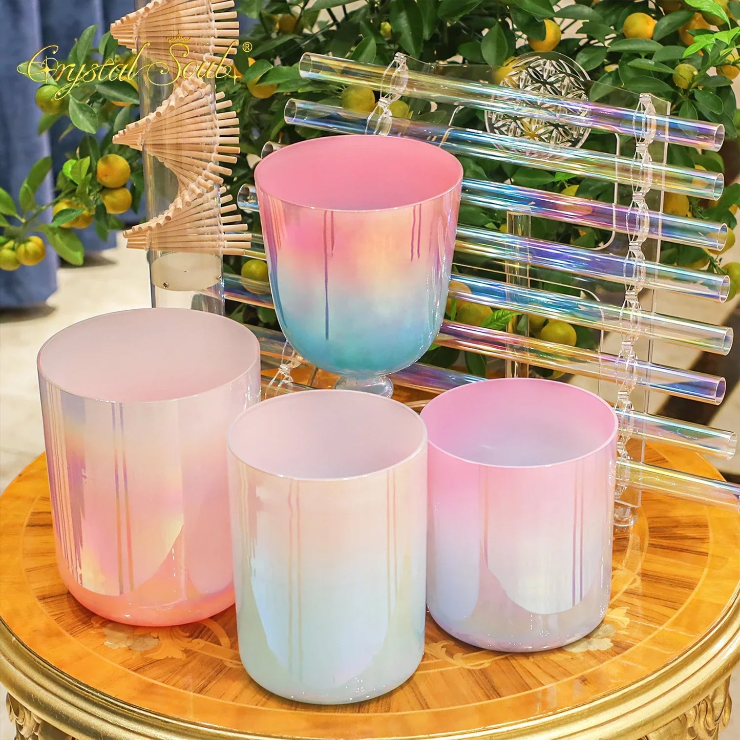 Pastel gradient glass singing bowls with iridescent finishes and ribbed textures for crystal soul essential sound therapists essential instrument