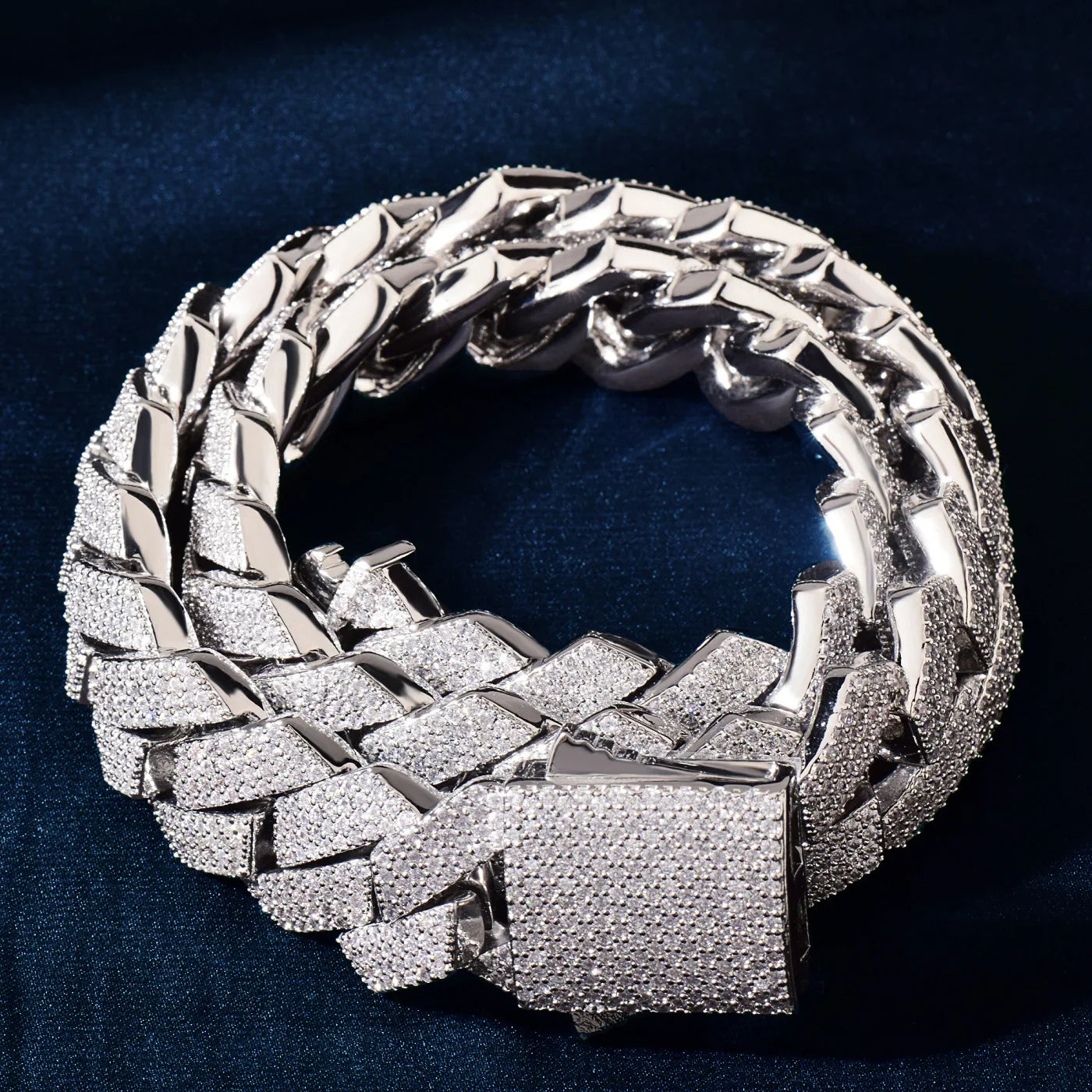 A thick silver-toned pavé zirconia link fashion bracelet matching the cuban chain gold miami cuban chain style