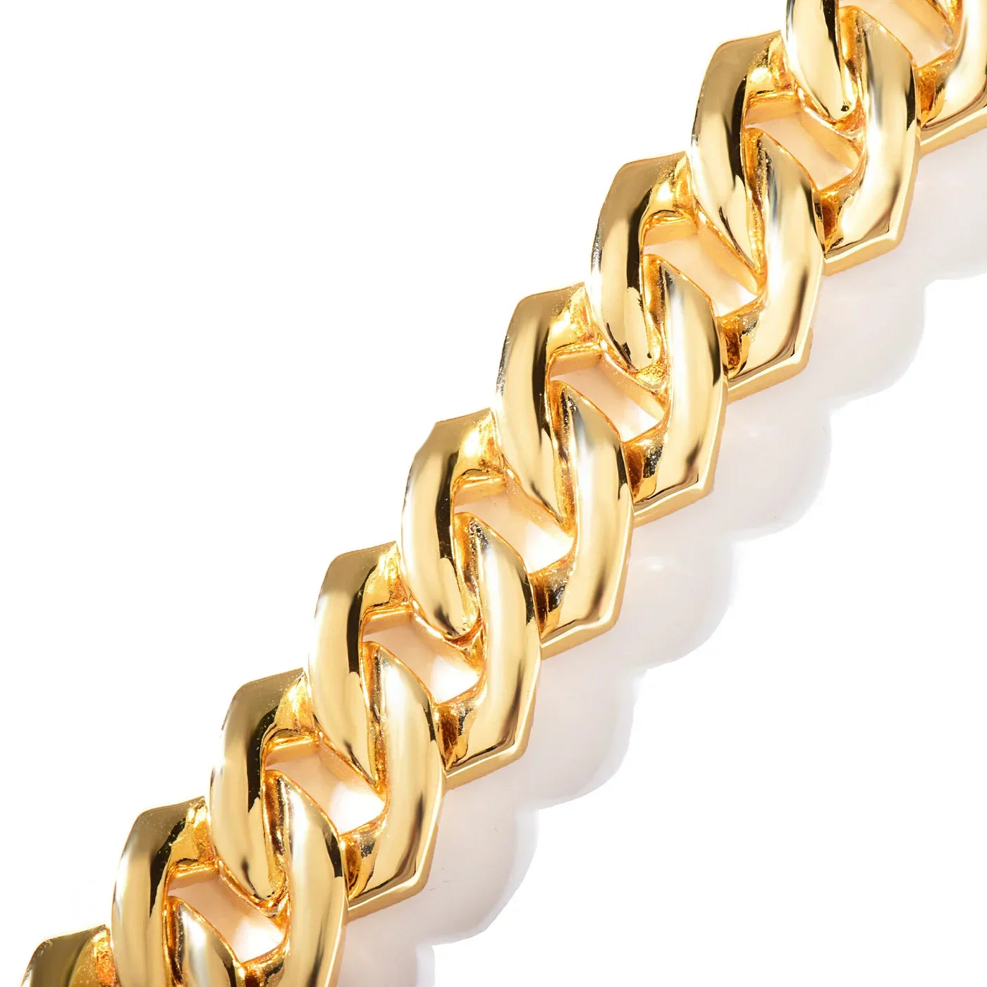 Gold-colored thick miami cuban chain bracelet with polished metallic finish and zirconia link fashion design