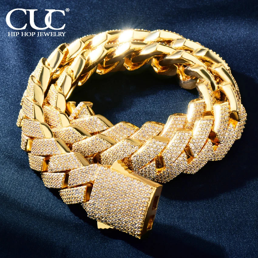 Gold-colored cuban chain gold bracelet with heavily diamond-encrusted zirconia link fashion and matching clasp