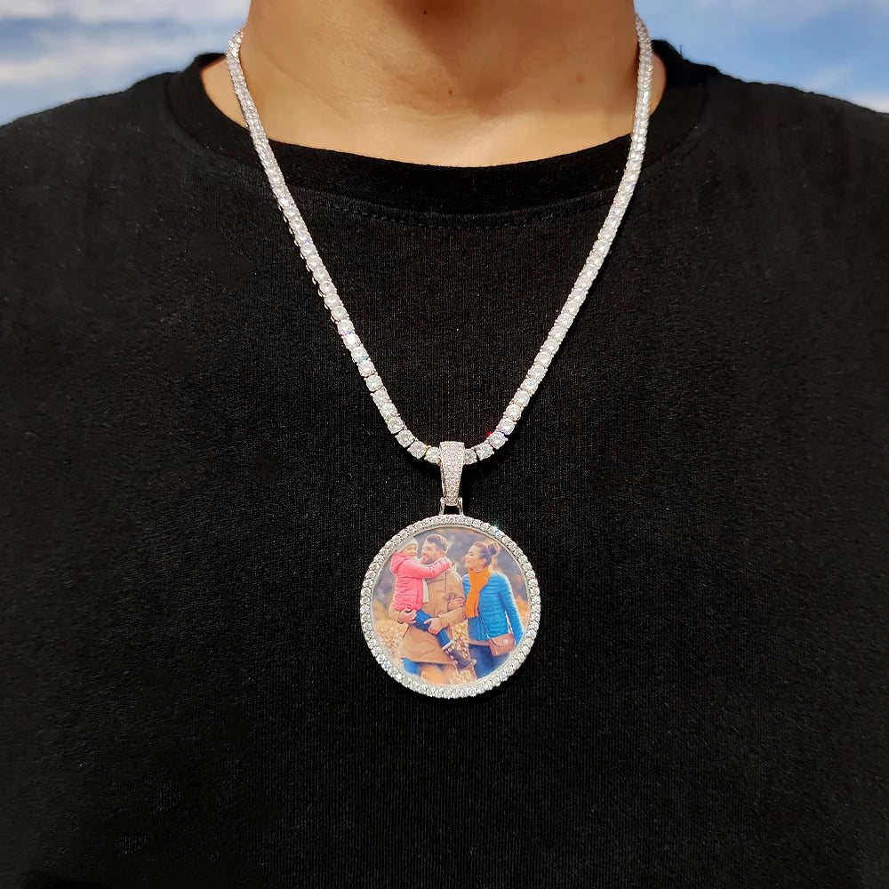 A sparkling silver photo medallions 18k gold necklace pendant iced with diamonds featuring a colorful personalized image