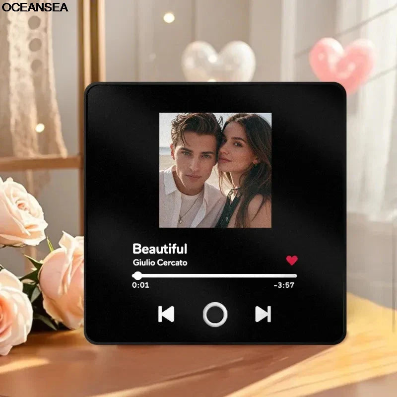 Black rectangular digital photo frame displaying a couple’s portrait with custom music album info in personalized refrigerator magnets best christmas gift