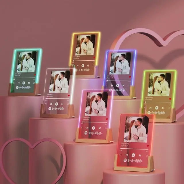 Neon-lit customized spotify music plaque with multicolor glowing borders and wooden base for romantic anniversary gifts