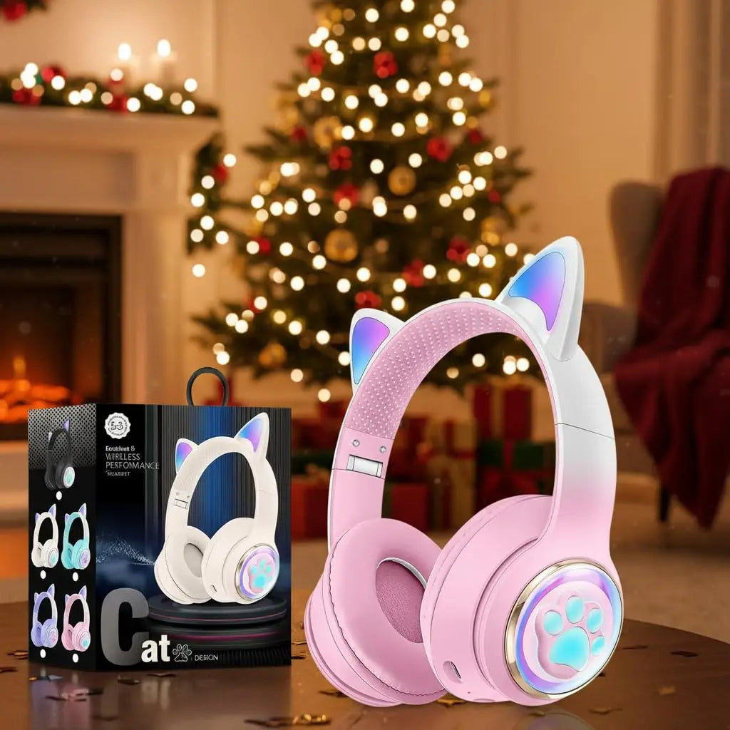 Pink cat wireless headphones with microphone noise cancelling and glowing paw print accents for kids