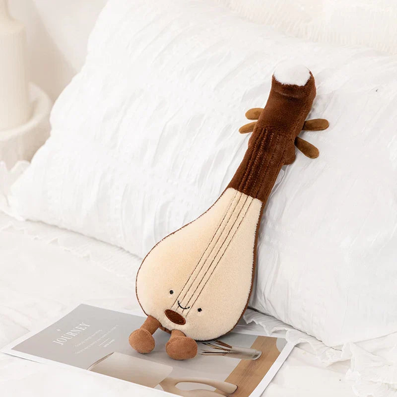 Cute brown and cream soft violin guitar plush toy with embroidered strings and smiling face for music lover gifts
