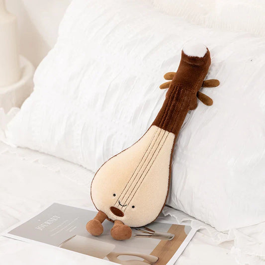 Cute brown and cream soft violin guitar plush toy with embroidered strings and smiling face for music lover gifts