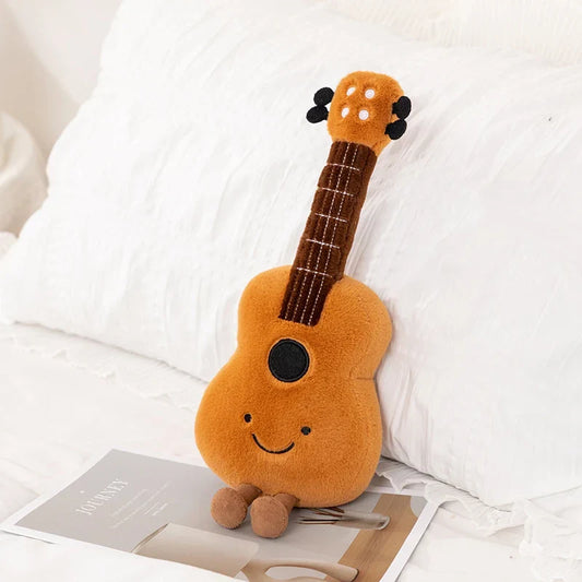 Orange plush cute musical plush ukulele with smiling face black soundhole and brown corduroy neck toy gift for kids