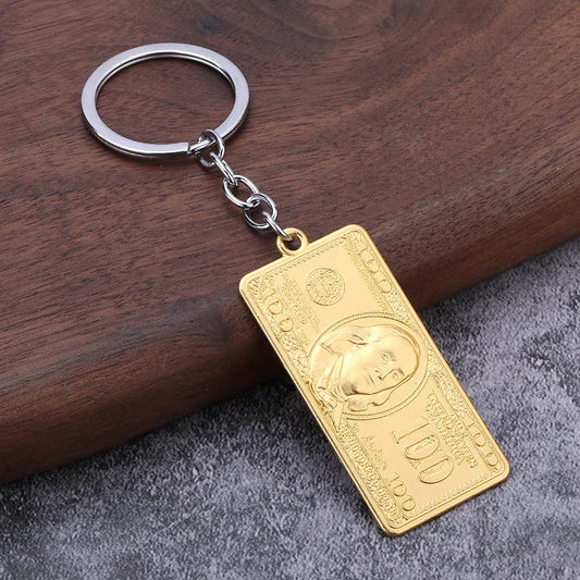 Gold-colored cute vintage dollar model keychain with embossed portrait for matching airpods keyrings and boutique accessories