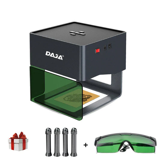 Black daja dj6 laser engraver machine cnc with green protective shield engraving a sample card for mini logo marking