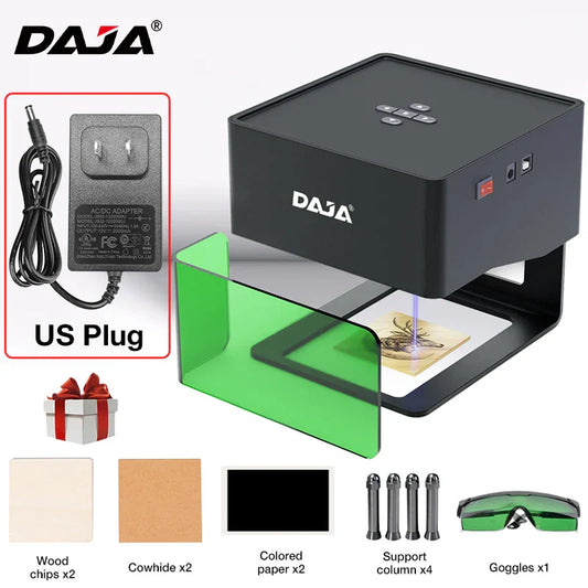 Black daja mini portable laser engraver with green translucent panel and purple laser beam scanning a specimen
