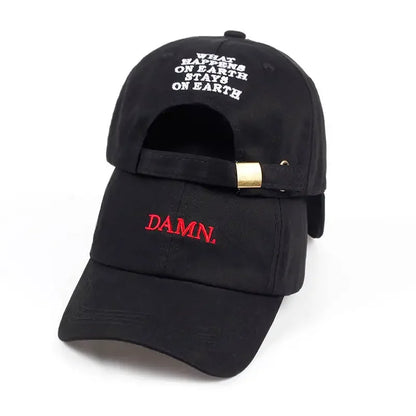 Black embroidered dad hat for men and women with red damn on front white text on back gold metal buckle