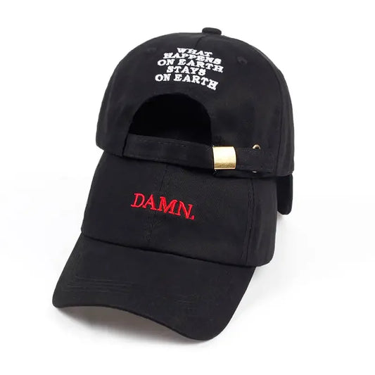Black embroidered dad hat for men and women with red damn on front white text on back gold metal buckle