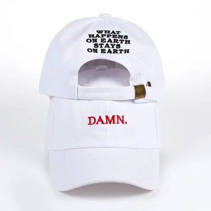 White embroidered dad hat for men and women with bold red damn text on front and earth text on back side