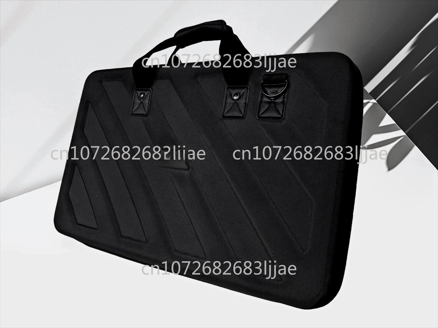 Black textured ddj1000srt flx6 grv6 controller bag with diagonal paneling and reinforced handles for dj equipment