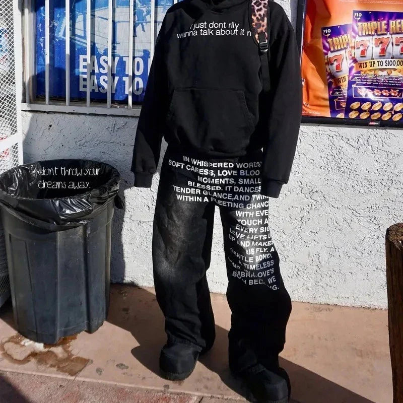 Black hoodie with relaxed fit drawstring hood and deeptown vintage letter print paired with harajuku washed wide man jeans y2k