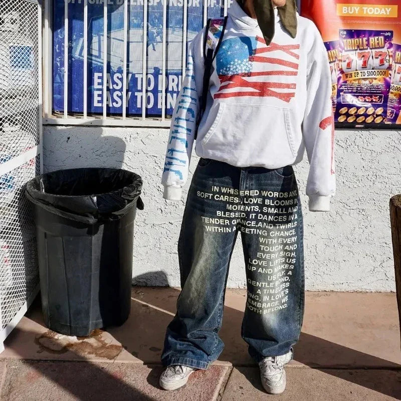 White hoodie with american flag graphic and blue text paired with deeptown vintage letter harajuku washed wide man jeans y2k