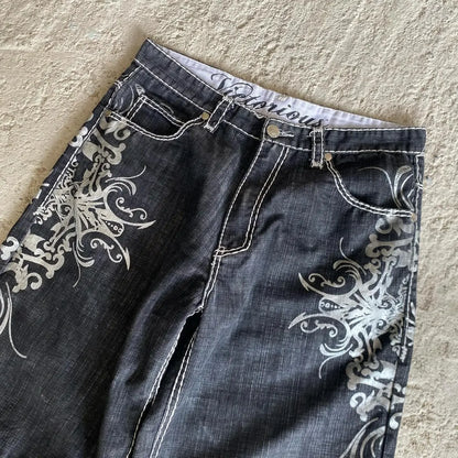 Dark denim basketball shorts y2k with intricate white hip hop heraldic embroidery and contrasting stitching on sides