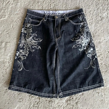 Dark denim shorts y2k harajuku with intricate white ornate hip hop heraldic embroidery on the sides for casual wear