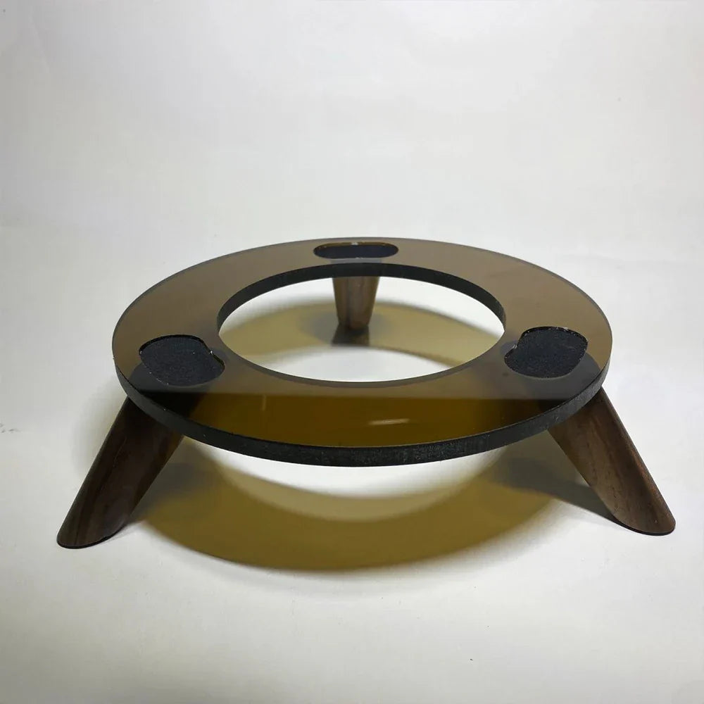 A sleek amber-tinted glass desktop audio stand with solid wood base for harman kardon aura and 4th huaqiangbei lp90
