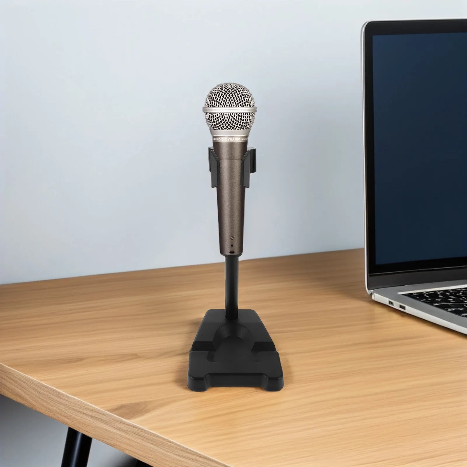 A sleek metallic desktop microphone stand with spring clip fixation in dark gray for clip fixation recording and streaming