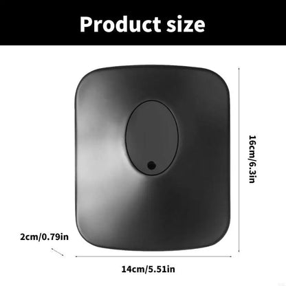 Black square-shaped smart home device with rounded edges and central oval button for professional studio monitors