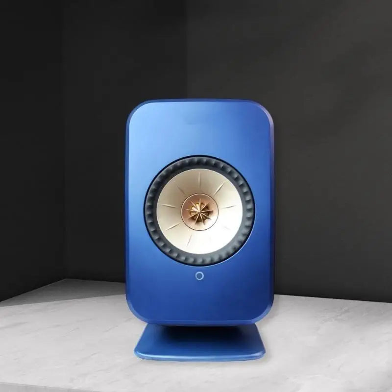 Blue rectangular desktop speaker with gold cream cone and metallic finish on professional studio monitors stand for surround sound speaker