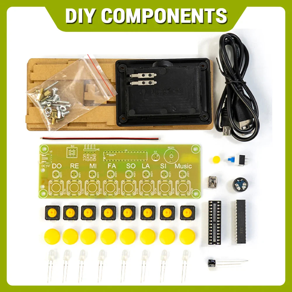 Green circuit board with labeled musical notes and yellow push buttons in an 8 keys electronic piano kit for soldering practice
