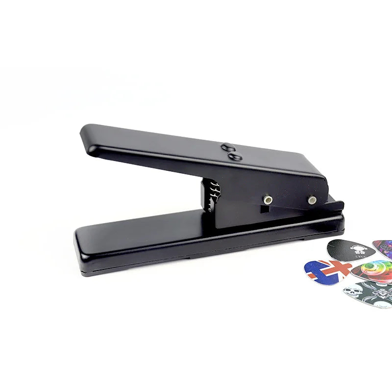 Black metal guitar pick punch with ergonomic design and spring mechanism for diy guitar pick making acoustic electric bass