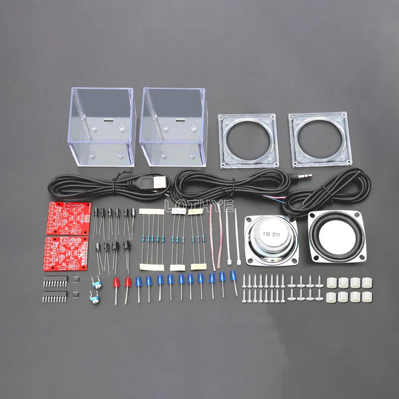 Clear acrylic diy mini speaker enclosures with silver circular drivers and transparent electronic components for audio kits
