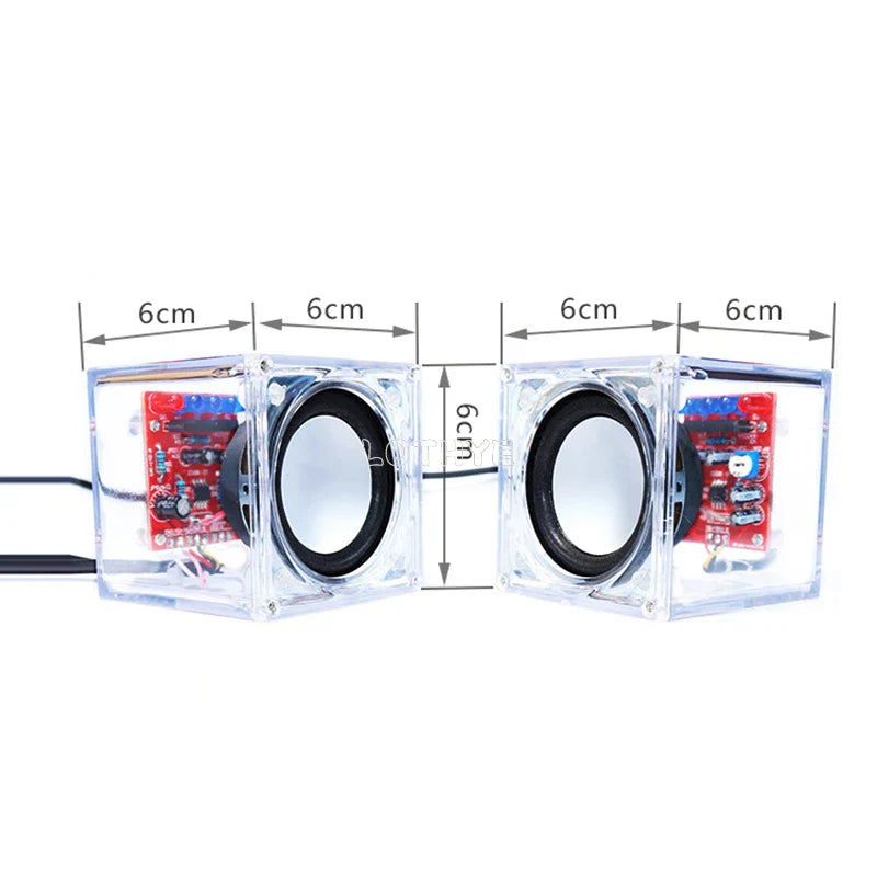 Clear diy mini speaker electronic kit featuring transparent cube casing with red circuit boards and black drivers inside