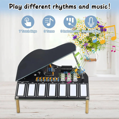 Black electronic piano practice kit with 7 touch keys and visible circuit board for soldering recorded music press button