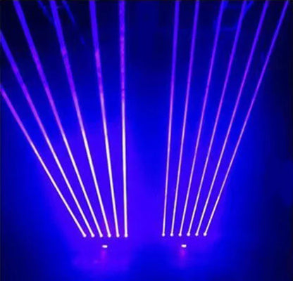 Purple and white laser beams from a laser projector 6x500mw eyes beam lasers with dmx control moving on dark blue stage