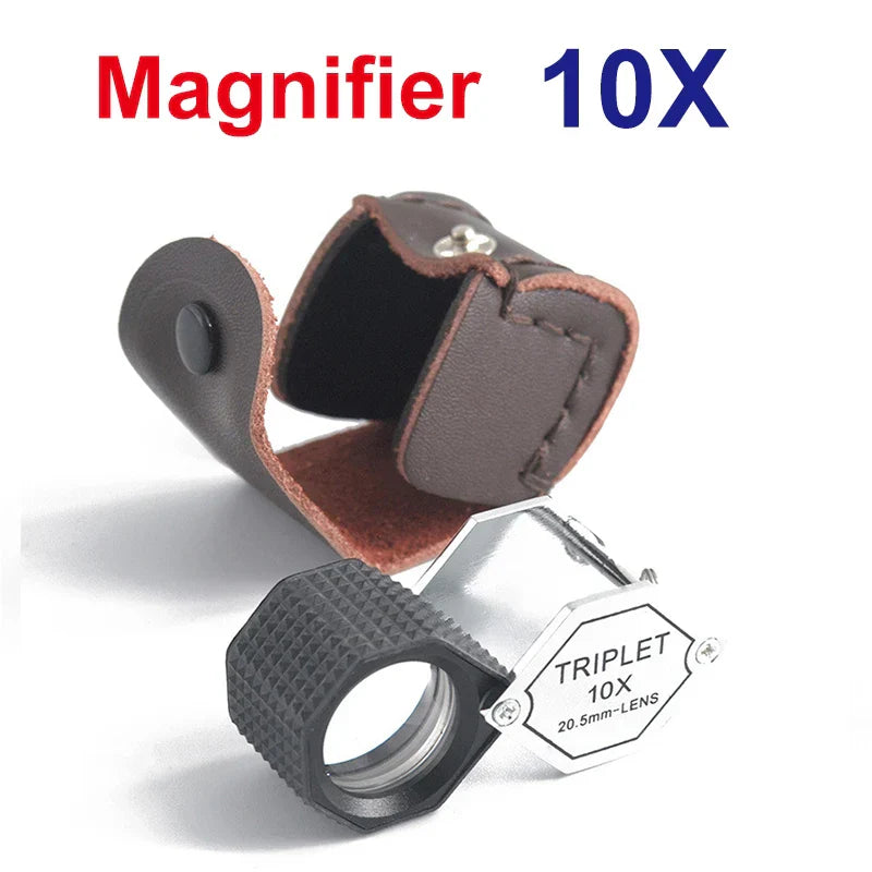 A compact 10x magnifier with black grip and silver frame in a brown case for djmax diamond tester and gemstone gem selector watcher tool led