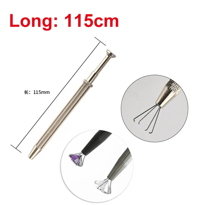 Silver metal diamond tester with textured grip and interchangeable diamond-shaped tips for gemstone gem selector use
