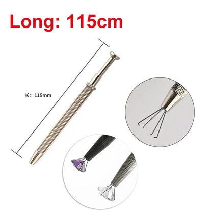 Silver metal diamond tester with textured grip and interchangeable diamond-shaped tips for gemstone gem selector use