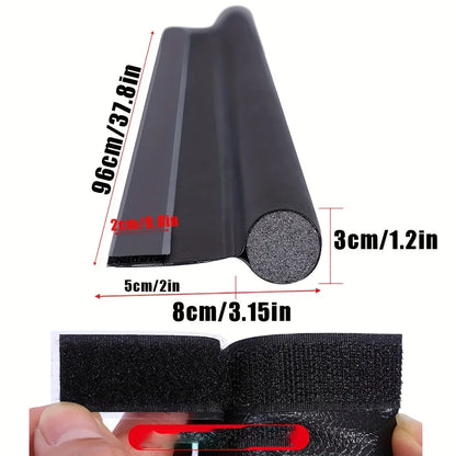 Black rubber door draft stopper with textured foam interior and adhesive velcro backing for sound-proof door strip gap blocker