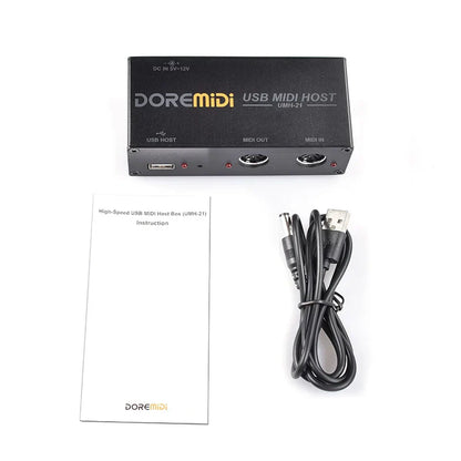 Black doremidi usb midi host box with matte finish showing labeled usb host midi out and midi in ports for midi interfaces
