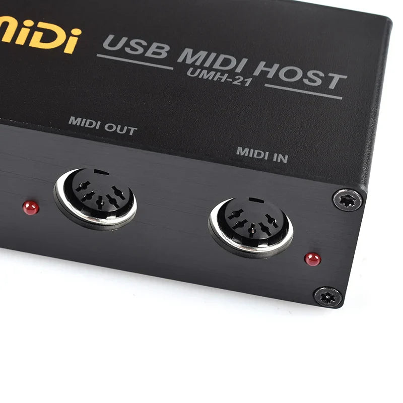 Black midi usb midi host box with silver-trimmed ports and red indicator lights for high-speed midi conversion
