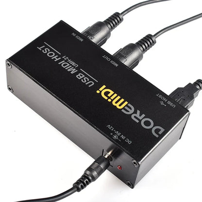 Black doremi usb midi host box with yellow branding multiple ports and indicator light for high-speed midi conversion