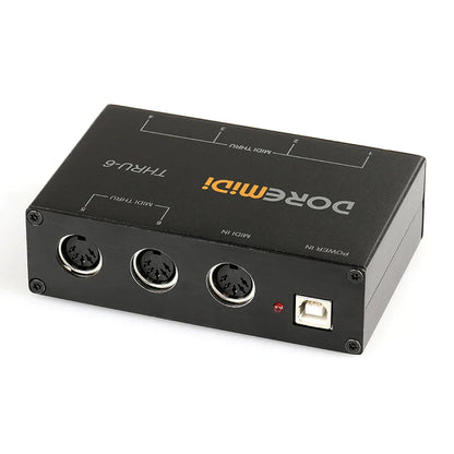 Black doremidi midi thru-6 box showing three 5-pin din ports and usb port on the back for type beat music use