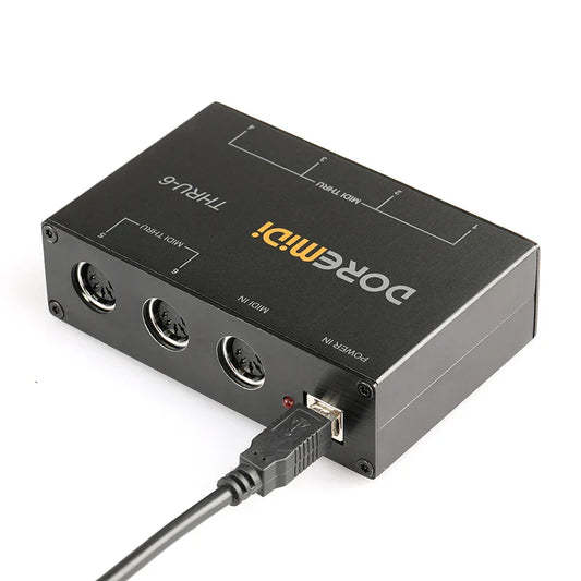 Black doremidi thru-6 midi splitter back side with three 5-pin din ports and usb for real-time zero delay connections