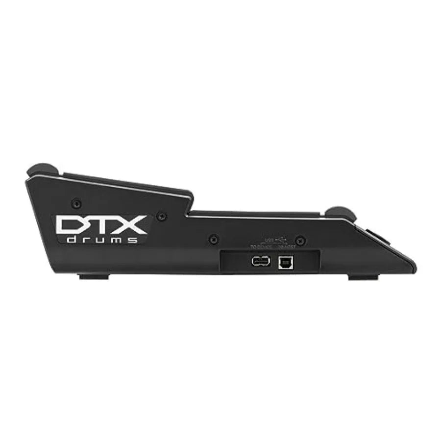 Black dtx multi pad electronic drum module with production black durable design and responsive touch sensitivity ports visible