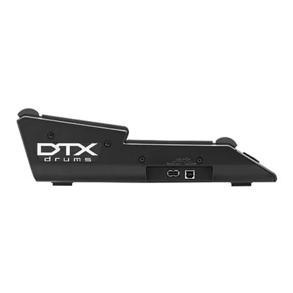 Black dtx multi pad electronic drum module with production black durable design and responsive touch sensitivity ports visible