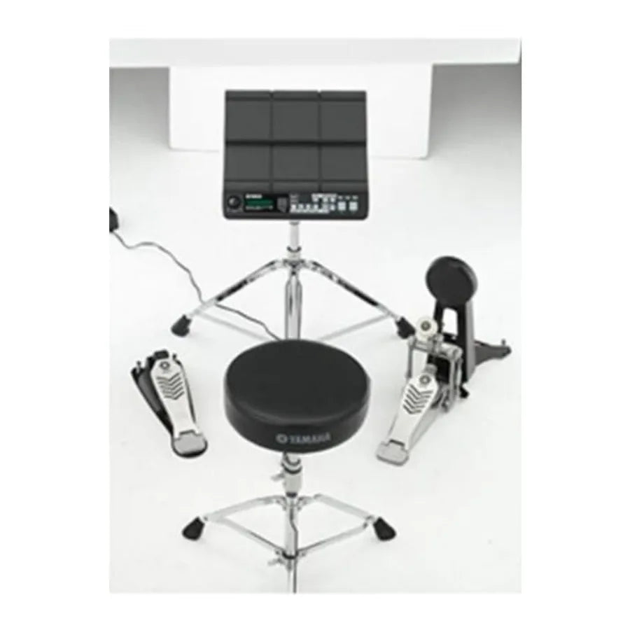 Black yamaha dtx multi pad electronic drum pad with production black durable design and responsive touch sensitivity on silver stand