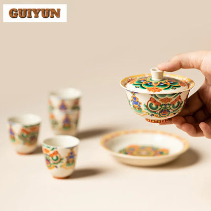 Hand holding a guiyun porcelain teapot from dunhuang music dance creative products tea complete set zen ceremony set