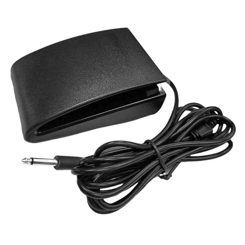 Black plastic durable sustain pedal with coiled cable and silver 6.35mm jack for midi keyboards and drum machines accessory