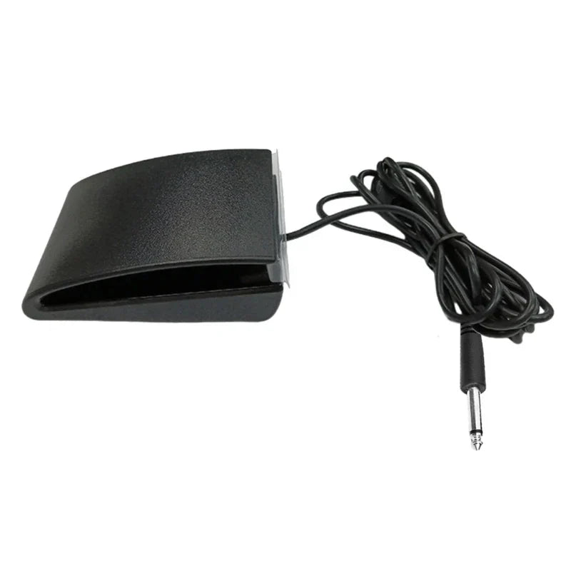 Black durable sustain pedal with rubberized surface and coiled cable for midi keyboards and drum machines accessory