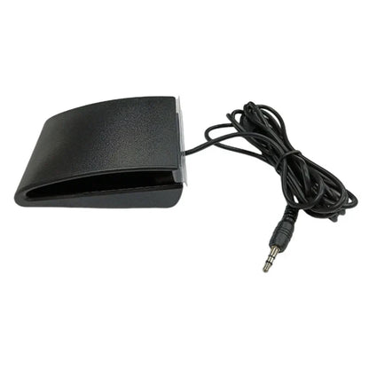 Black textured durable sustain pedal with coiled cable and 3.5mm jack for midi keyboards and drum machines accessory