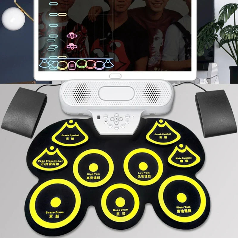Black and yellow electronic drum pad set with labeled pads paired with durable sustain pedal for midi keyboards and drum machines accessory