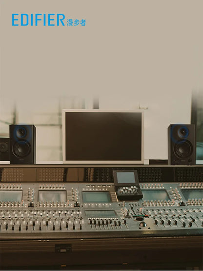Edifier MR4 powerful studio monitor speakers with black cabinets and blue accents for deep bass home audio